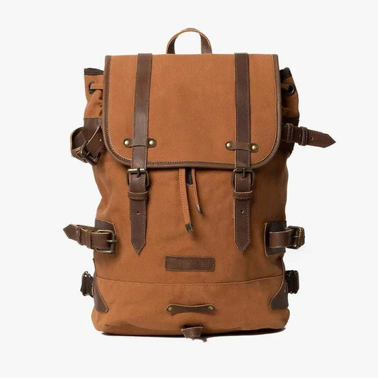 Derby Tier Backpack with organic waxed canvas, leather trim, and brass hardware