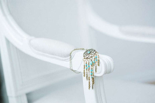 Turquoise dreamcatcher pendant necklace with silver feathers and beads