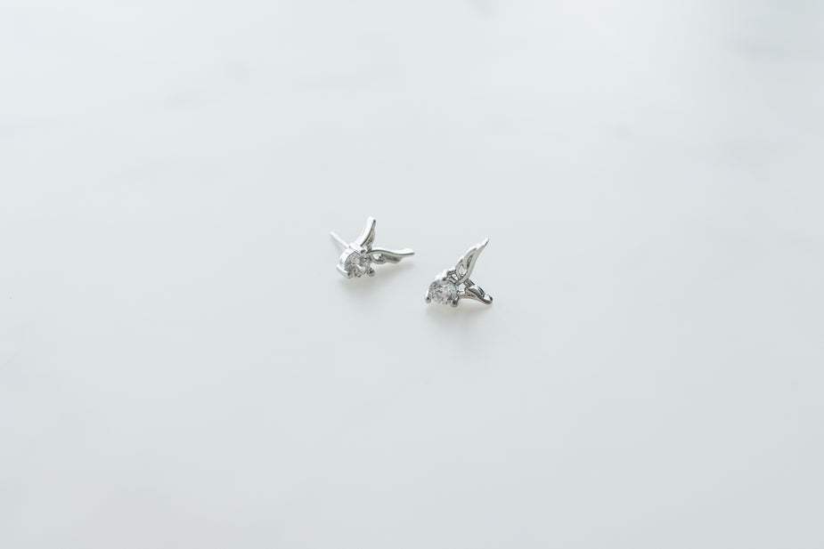 Sterling silver guardian angel earrings with diamond gemstones