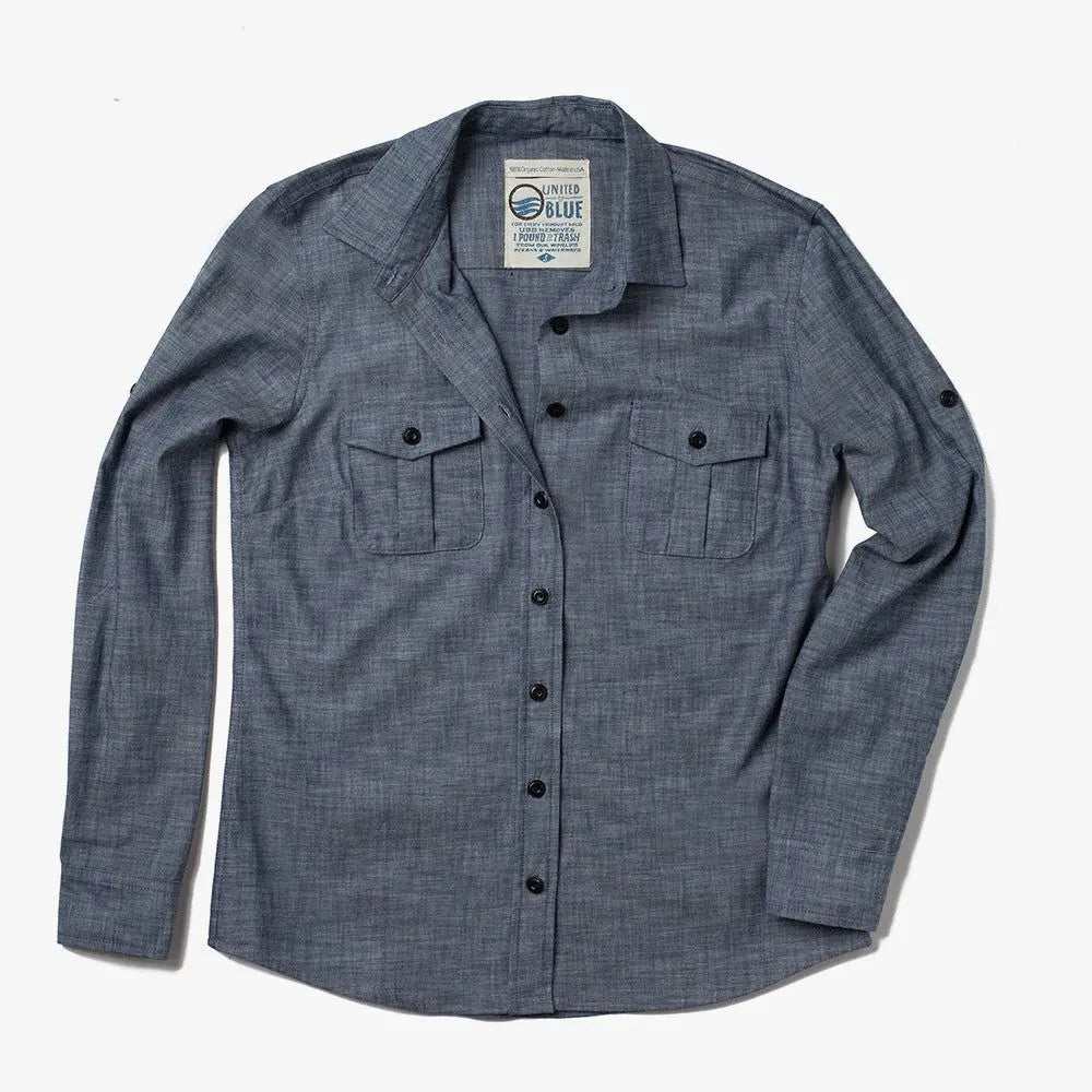 Woman wearing 100% organic cotton chambray shirt with natural Corozo buttons from United By Blue