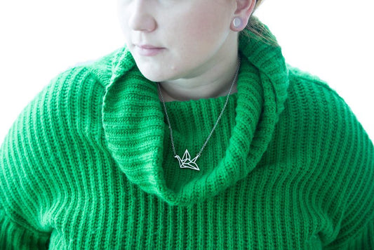 Sterling silver origami crane necklace on a chain