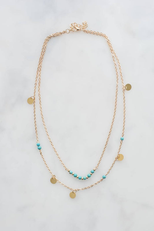 Pretty gold necklace with turquoise beads and double chain pendant design in 14k gold